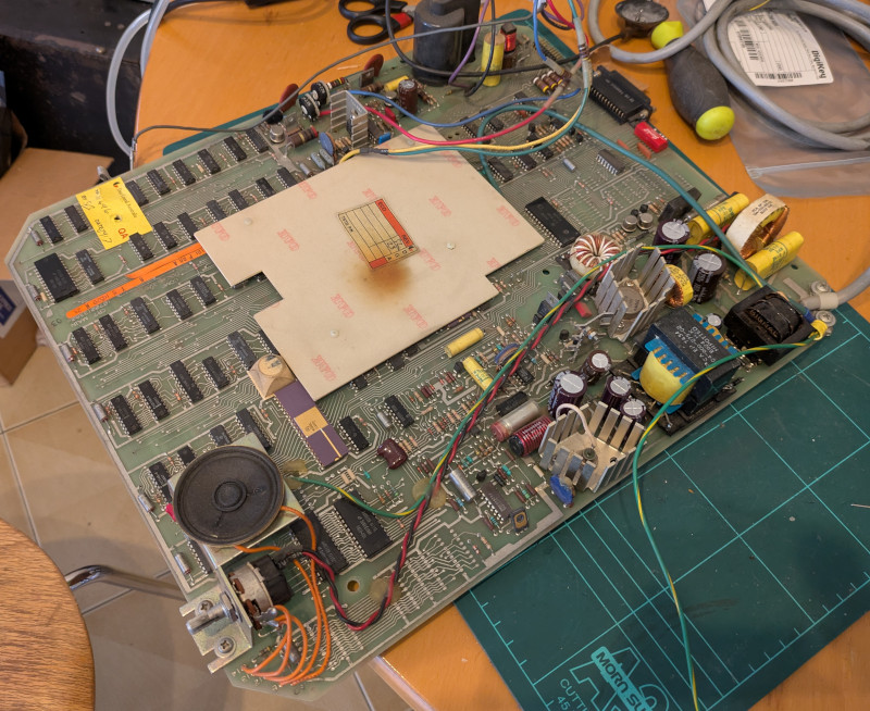 [Really bad picture of the mainboard with new capacitors]